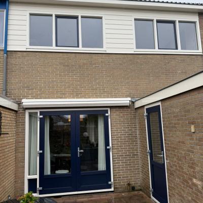 Kunststof openslaande klapdeuren naar de tuin